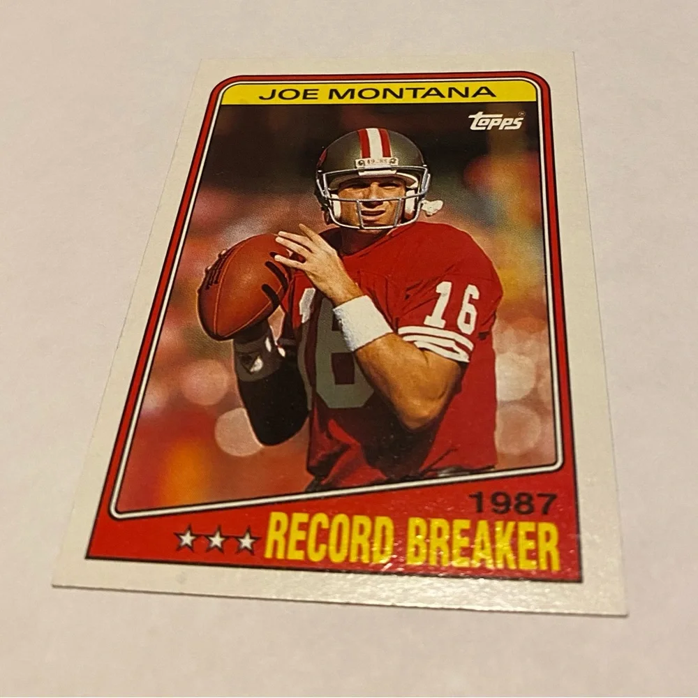 Joe Montana Record Breaker 1988 Topps Football Card #4 San Francisco 49ers